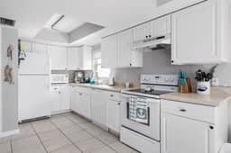 4 BR Oasis, water views every room steps to beach! - Image 5